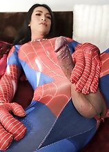 Ladyboy Lily is dressed in a spider-girl costume with her big cock hanging out. Watch her jerk off her cock and shoots a load of cum!