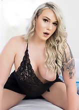 Looking stunning in her black nightwear blonde bombshell Aspen Brooks plays with her cock.