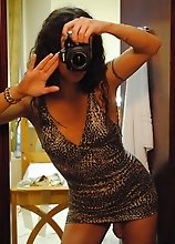 Seductive transsexual making pictures of herself